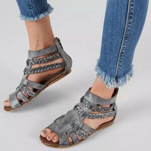 ROAN "Willa" Leather Gladiator Zip Up Sandals in a Misses size 6, fits 6.5 or 7